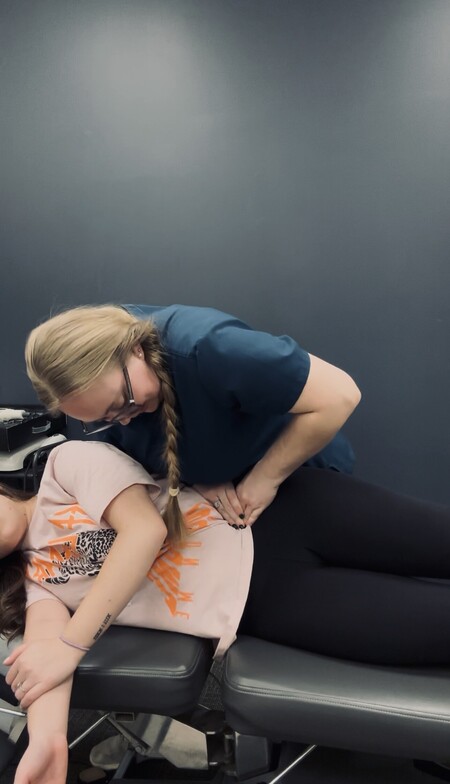 Side-lying ART soft tissue treatment for low back and hip pain at Anchor Chiropractic